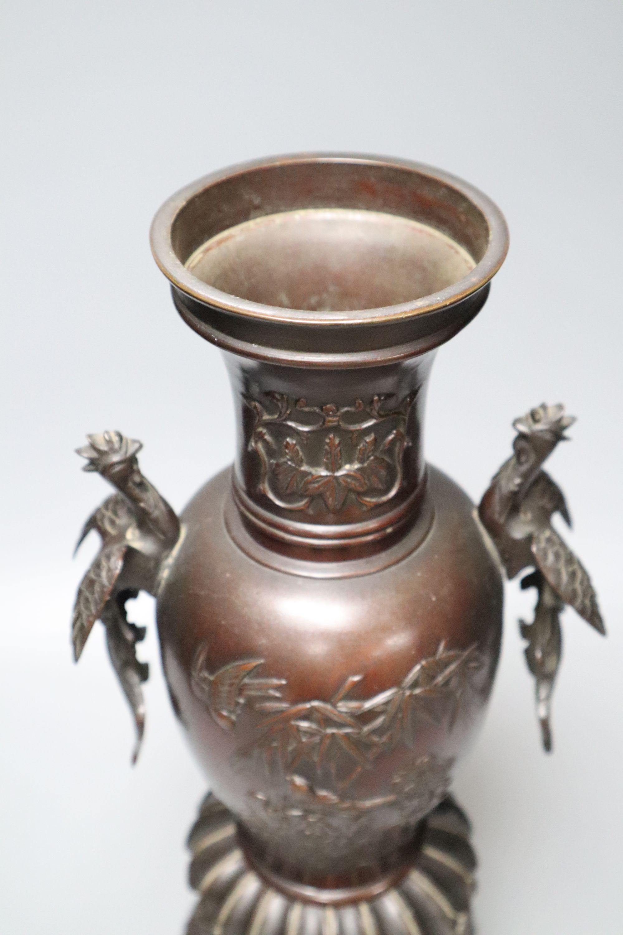 A 19th century Japanese Meiji period bronze censer vase, the handles formed as phoenix, height 41cm